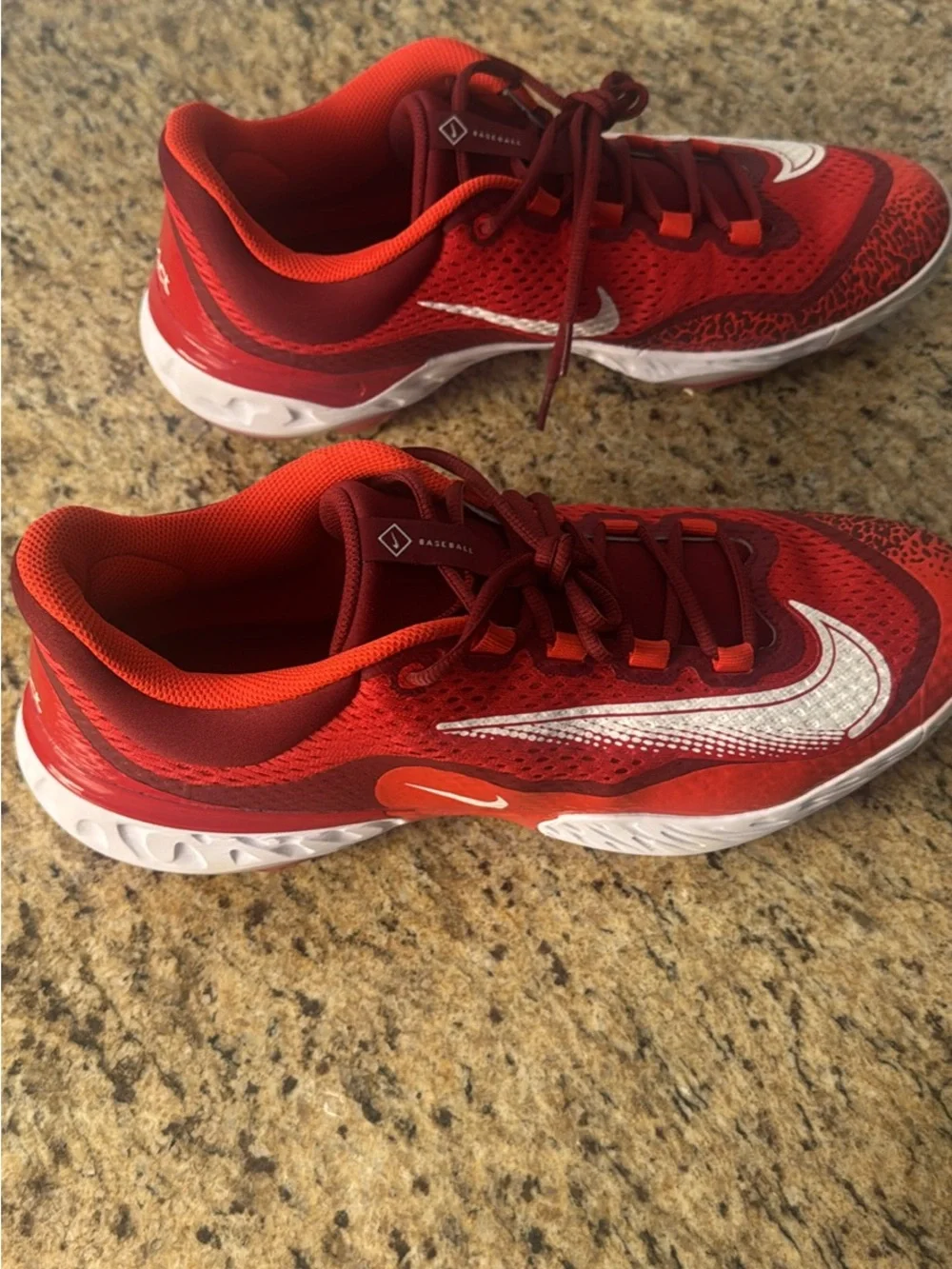 Nike Red and Maroon Baseball Cleats with White Swoosh